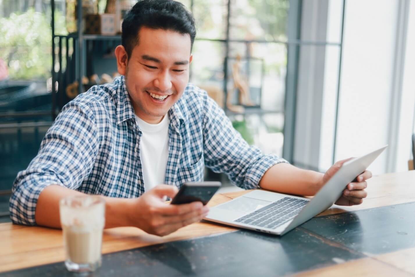 man looking at phone