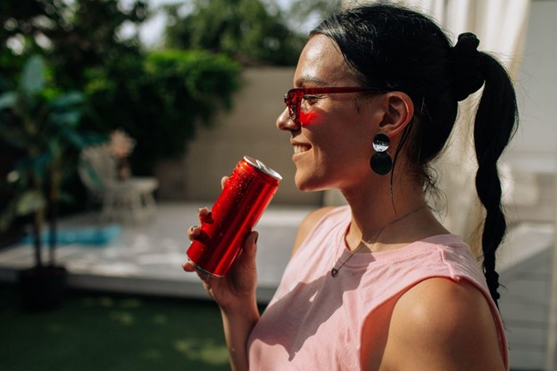 woman drinking energy drink