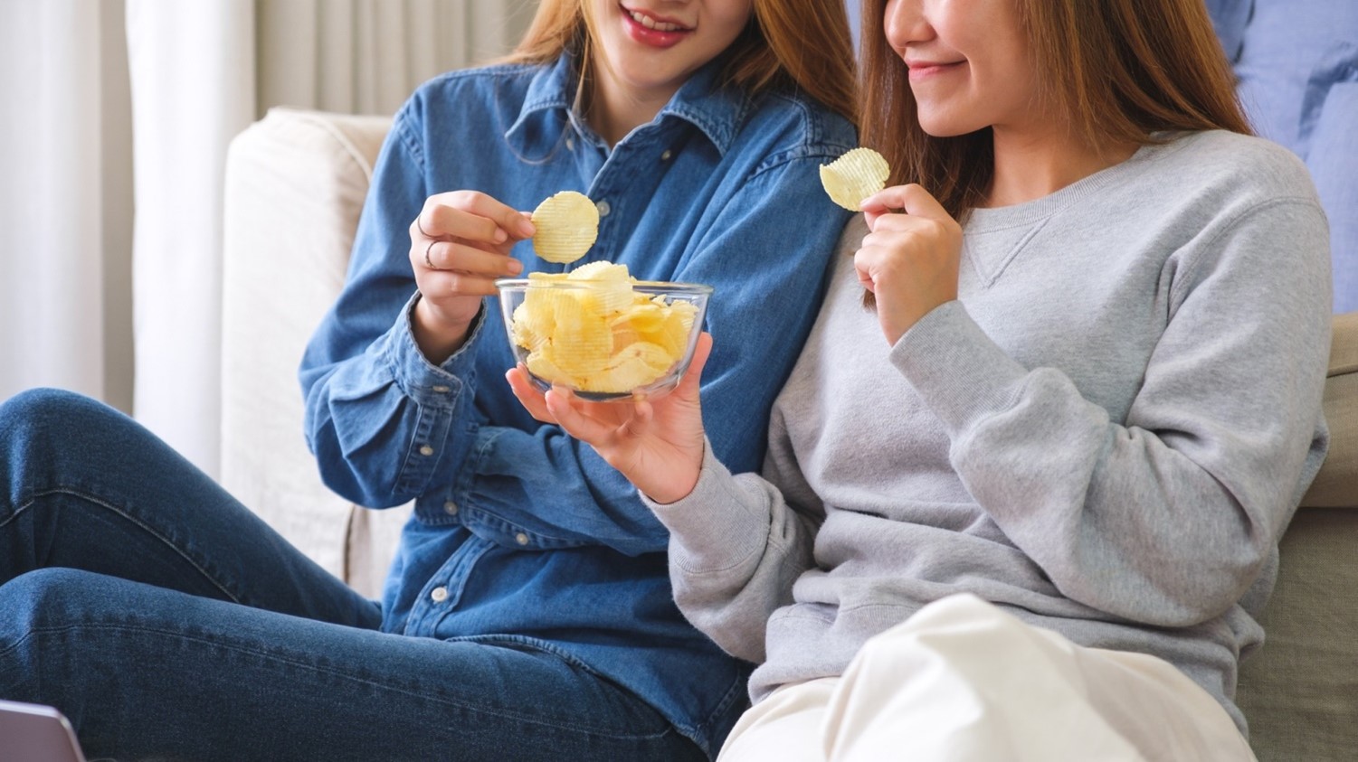 two people snacking