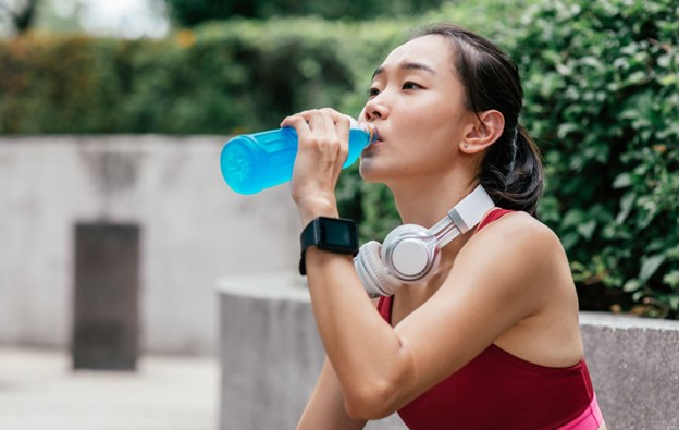 woman drinking beverage