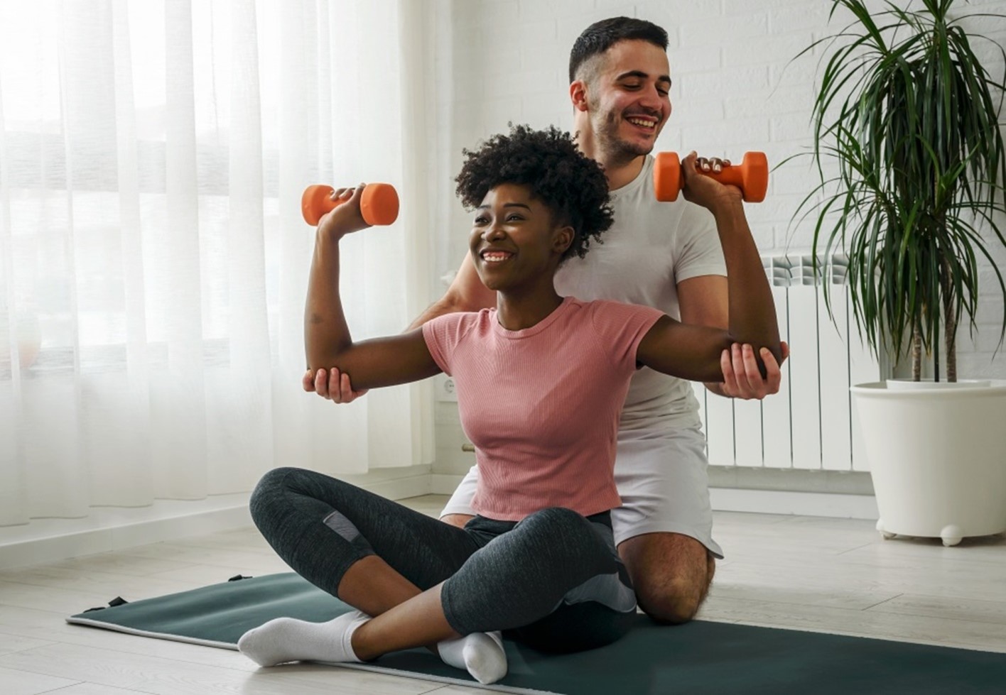 man and woman working out