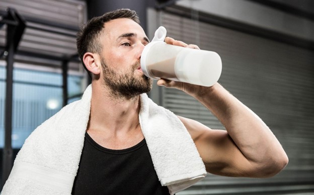 man drinking shake