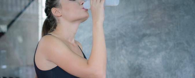 woman drinking beverage