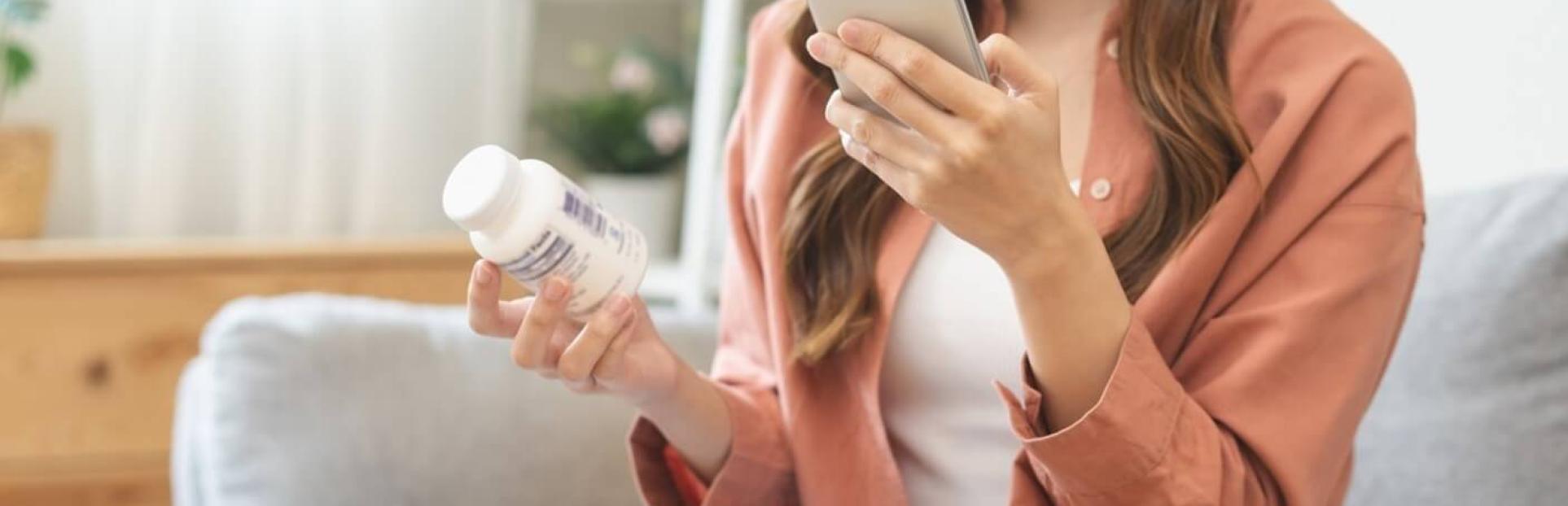 woman looking up supplements