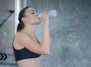 woman drinking beverage