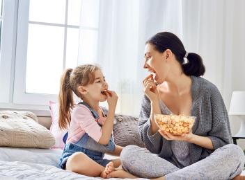 mom and child snacking