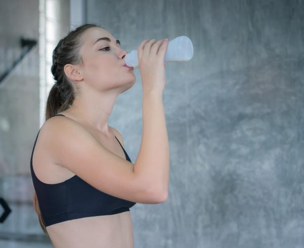 woman drinking beverage