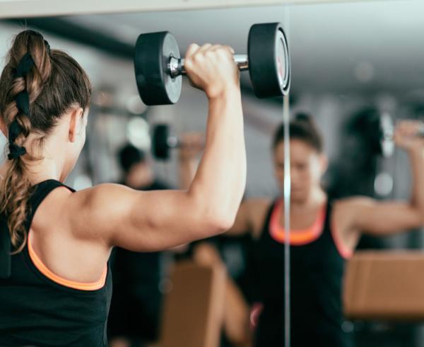 woman lifting weight